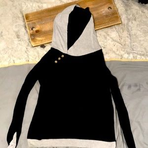 Black hoodie with slits for thumbs, unknown maker there are no tags
